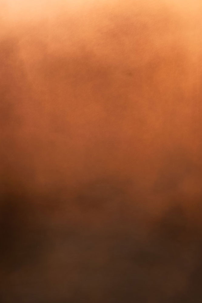 Musterfläche Helios: warmes kupferorange mit weichem verlauf